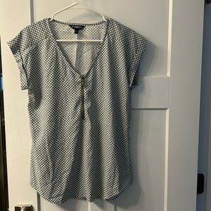 Gray and white dotted shirt